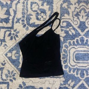 Black asymmetrical top. Perfect for nights out!!